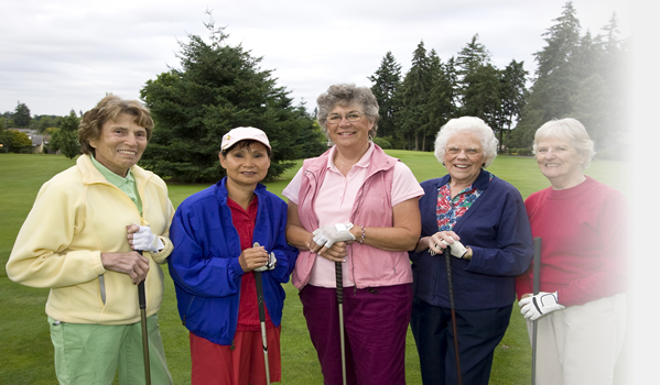 five woman standing and smiling